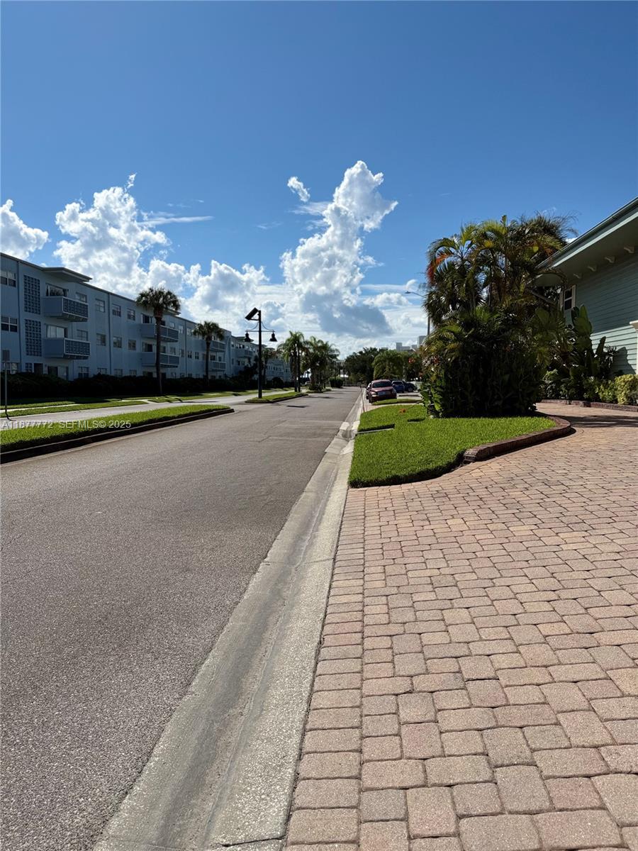 220 Columbia Drive, Unit 31 Cape Canaveral, FL 32920 - Photo 5 of 23 a view of a fountain in front of a house