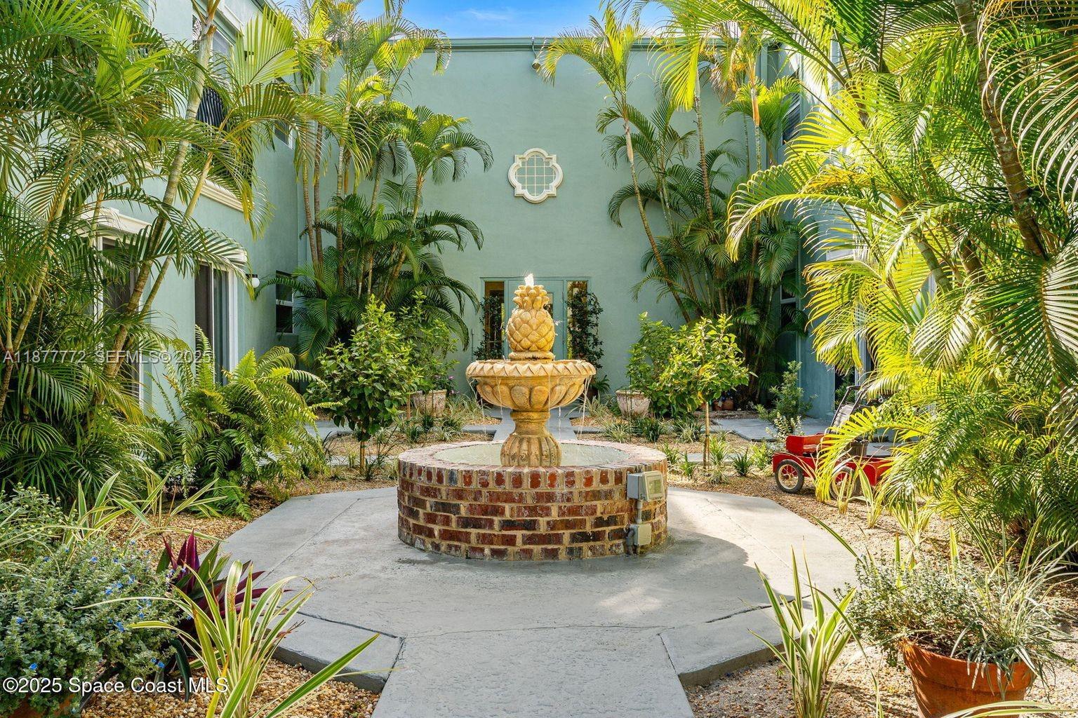 220 Columbia Drive, Unit 31 Cape Canaveral, FL 32920 - Photo 7 of 23 a view of a two chairs in the patio