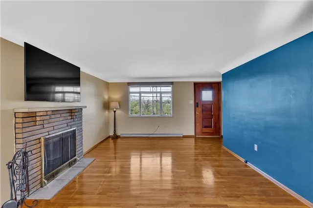 a view of livingroom with hardwood floor and a flat screen tv