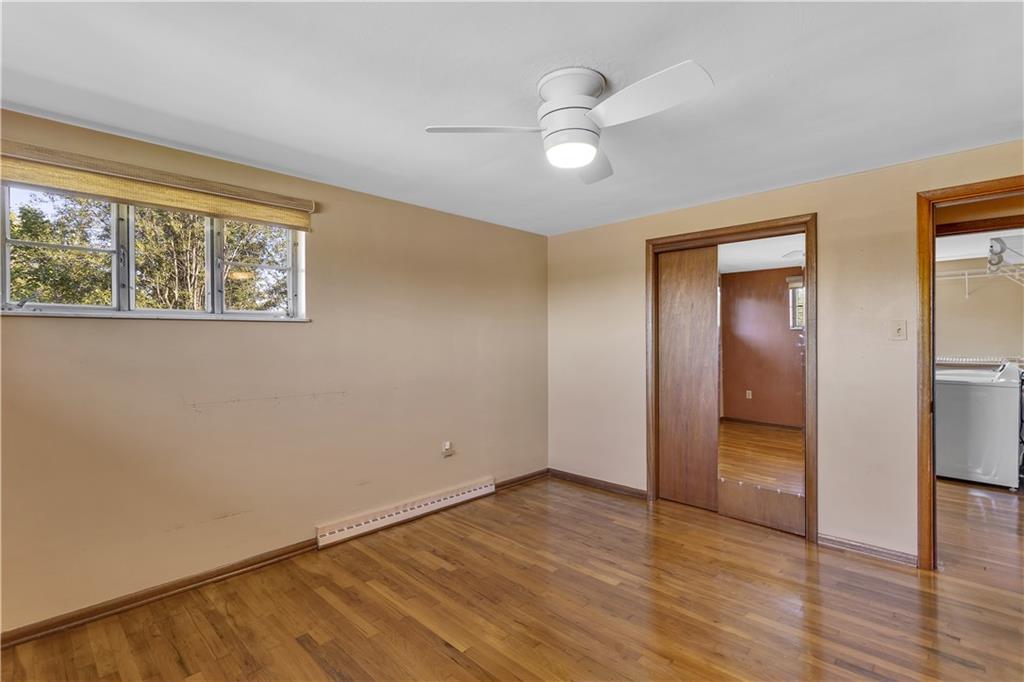 2520 Haymaker Road Monroeville, PA 15146 - Photo 23 of 33 a view of an empty room with wooden floor and a window