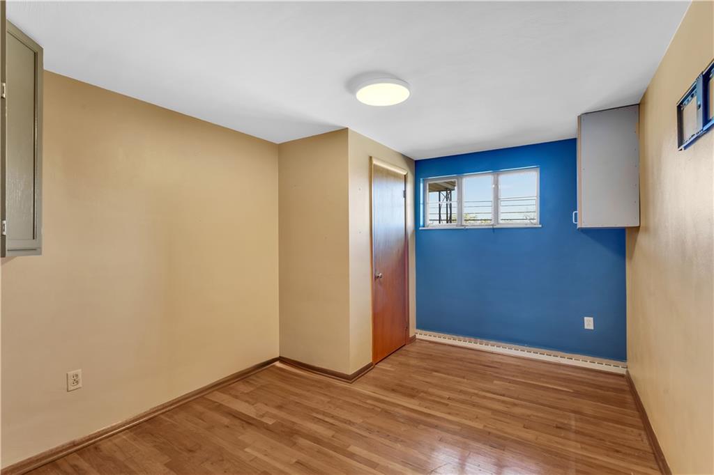 2520 Haymaker Road Monroeville, PA 15146 - Photo 24 of 33 a view of an empty room with window and wooden floor