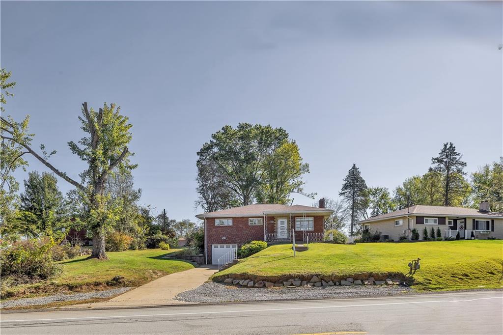 2520 Haymaker Road Monroeville, PA 15146 - Photo 32 of 33 a front view of a house with a yard and garage