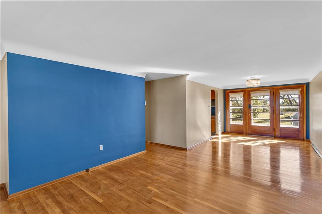 2520 Haymaker Road Monroeville, PA 15146 - Photo 10 of 33 a view of an empty room with wooden floor and a window