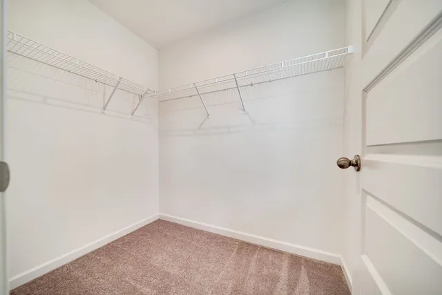 a view of a room with racks on the wall