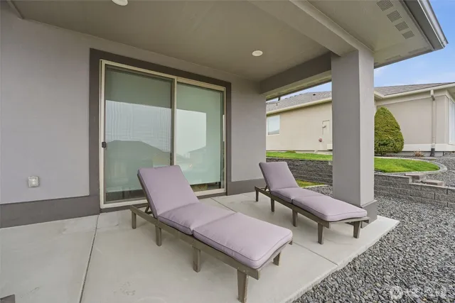 a outdoor space with lots of tables and chairs