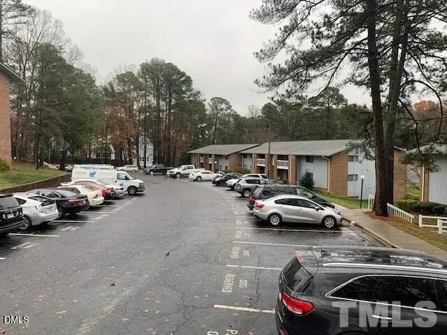 a car parked in front of a house