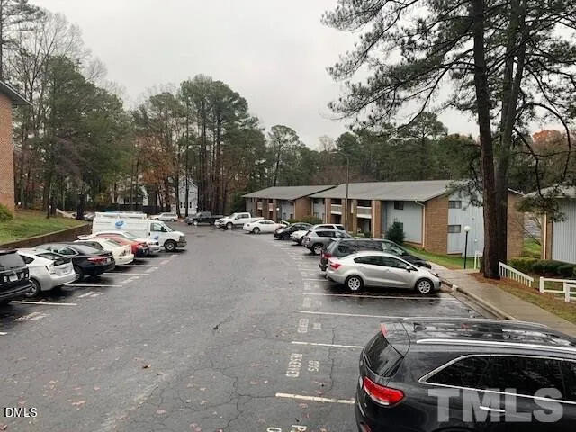 1010 Sandlin Place, Unit E Raleigh, NC 27606 - Photo 10 of 10 a car parked in front of a house