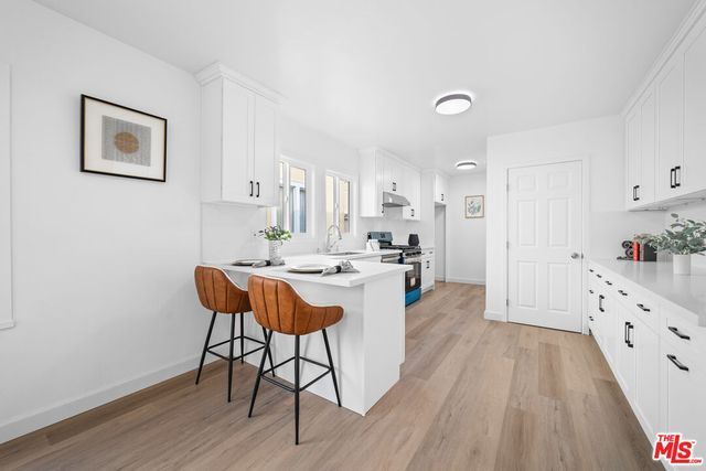 $1,399,000 | 1558 Hauser Boulevard, Los Angeles, CA 90019