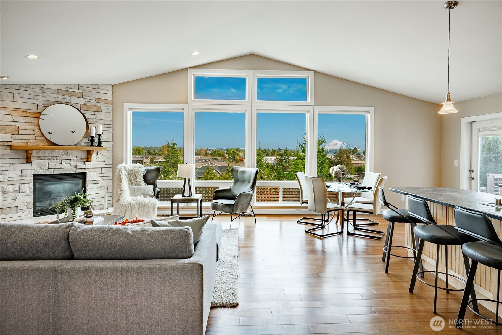 8124 Comox Road Blaine, WA 98230 - Photo 1 of 31 a living room with furniture and a fireplace
