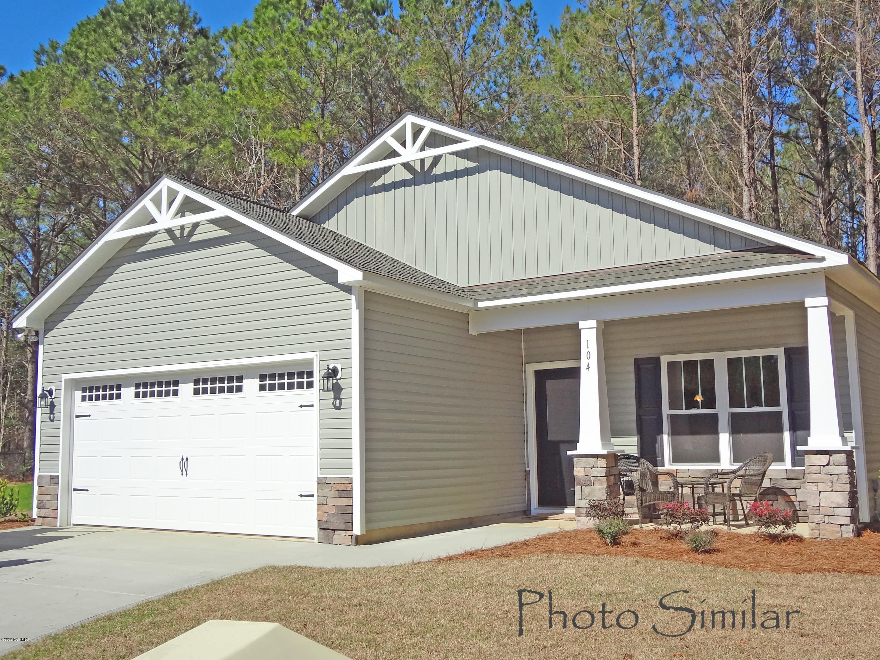 73 Owens Road Rocky Point, NC 28457 - Photo 1 of 13 Similar home, but this home will have a side load garage to fit on lot.
