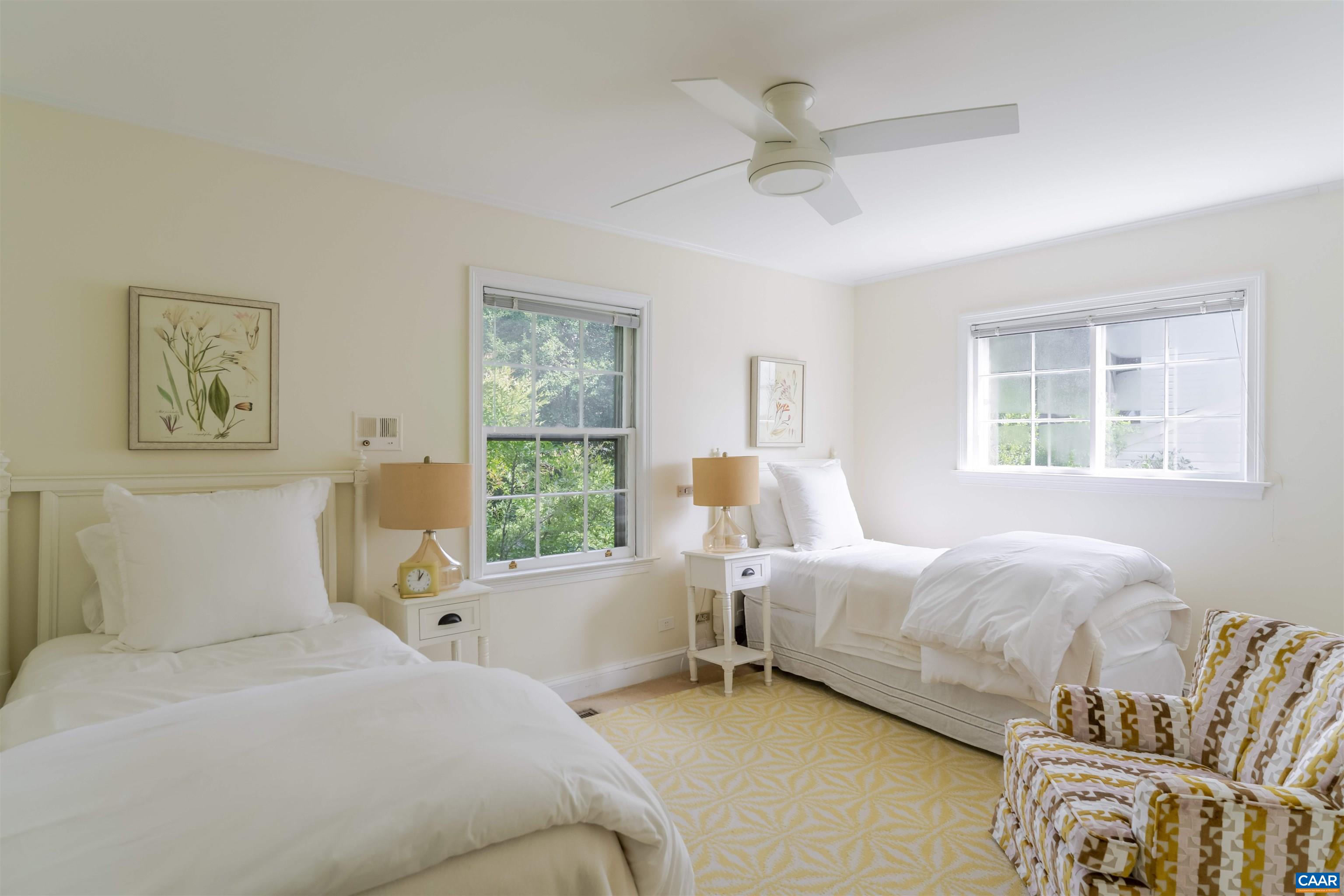 2904 Brookmere Road Charlottesville, VA 22901 - Photo 14 of 20 a bedroom with a bed and a large window