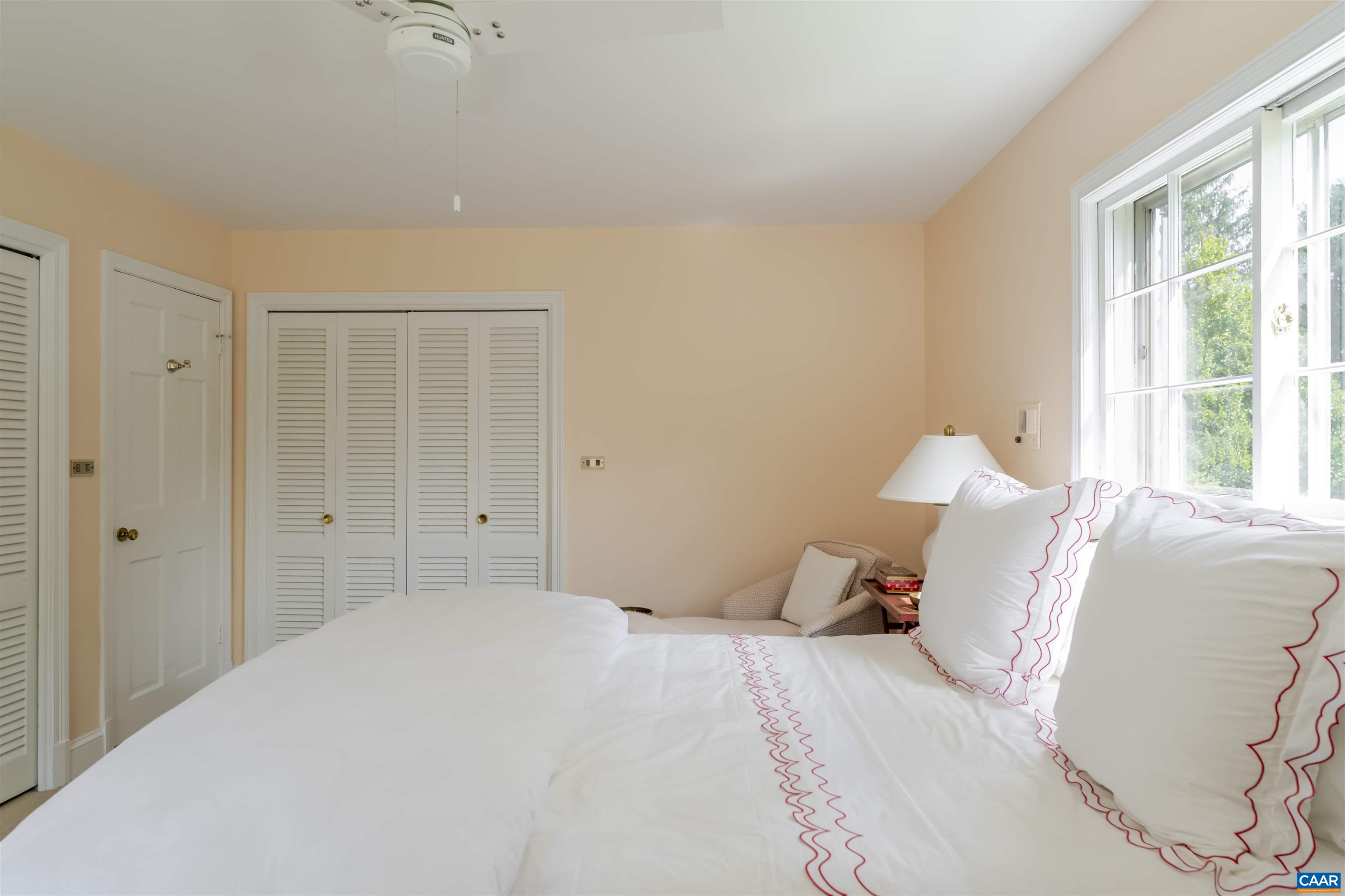 2904 Brookmere Road Charlottesville, VA 22901 - Photo 17 of 20 a bedroom with a bed and a window