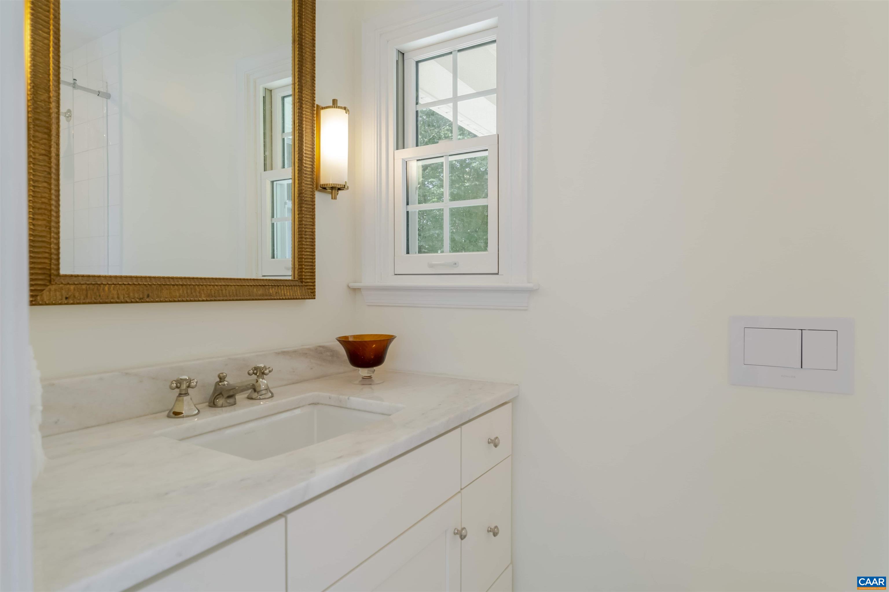 2904 Brookmere Road Charlottesville, VA 22901 - Photo 18 of 20 a bathroom with a sink and a window