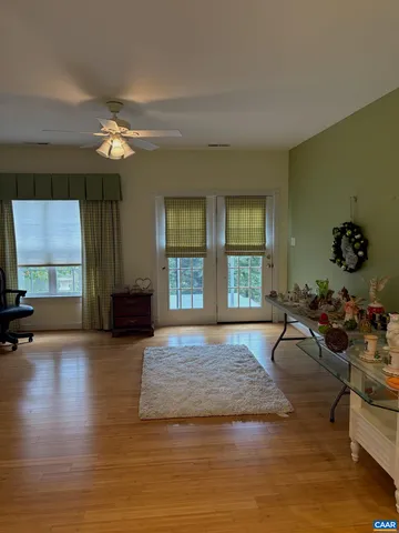 a living room with fireplace furniture and a flat screen tv