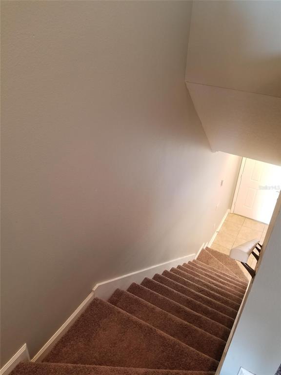 4536 Kennewick Place Riverview, FL 33578 - Photo 19 of 50 a view of a room with racks on the wall