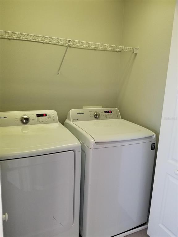 4536 Kennewick Place Riverview, FL 33578 - Photo 31 of 50 a utility room with dryer and washer