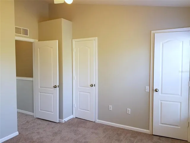 a view of a livingroom from a hallway