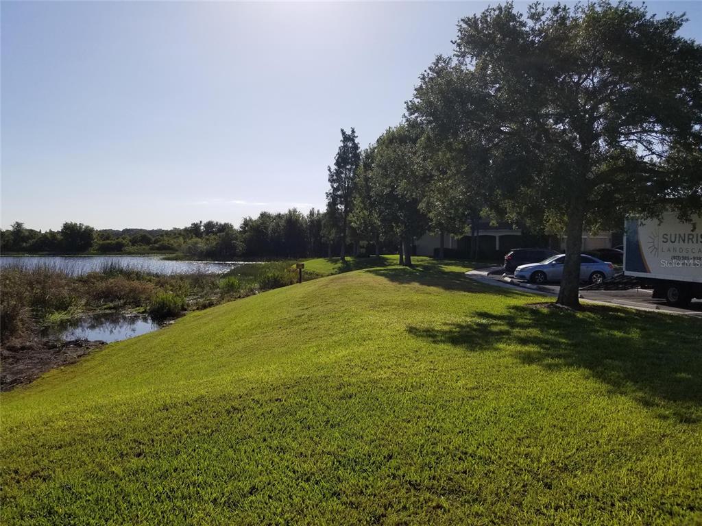 4536 Kennewick Place Riverview, FL 33578 - Photo 45 of 50 a view of a lake with a big yard