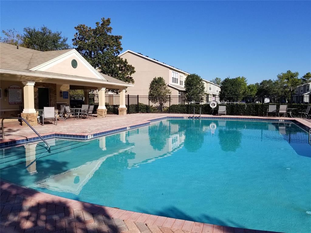 4536 Kennewick Place Riverview, FL 33578 - Photo 46 of 50 swimming pool view with a outdoor seating