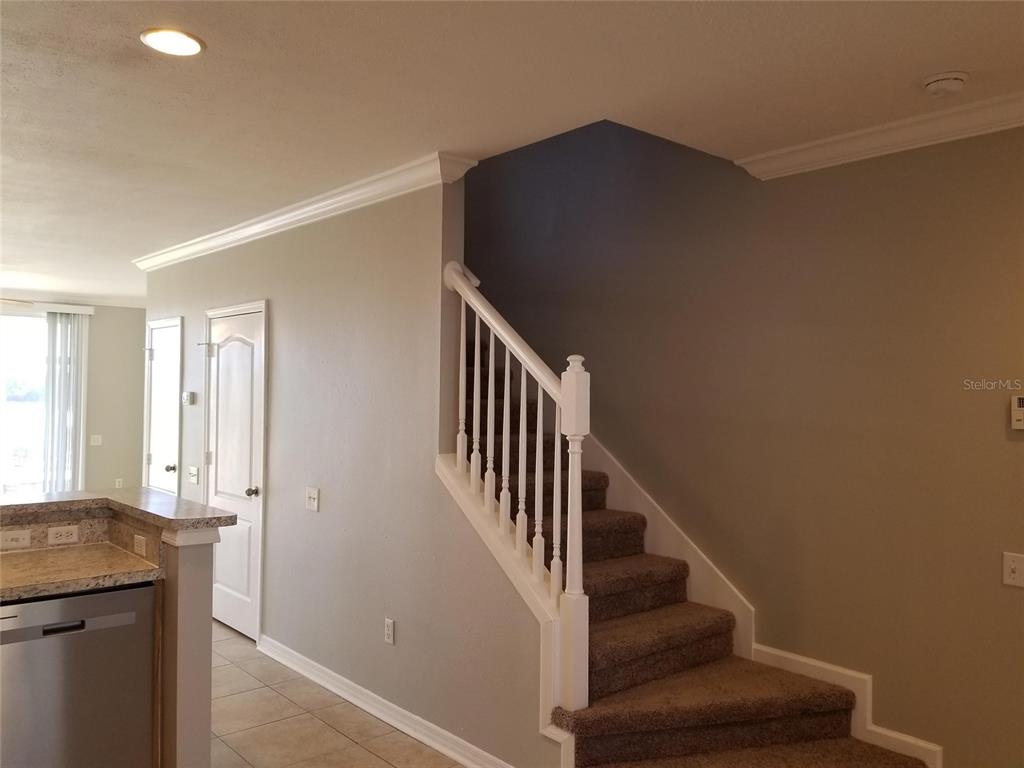 4536 Kennewick Place Riverview, FL 33578 - Photo 9 of 50 a view of entryway and hall with wooden floor