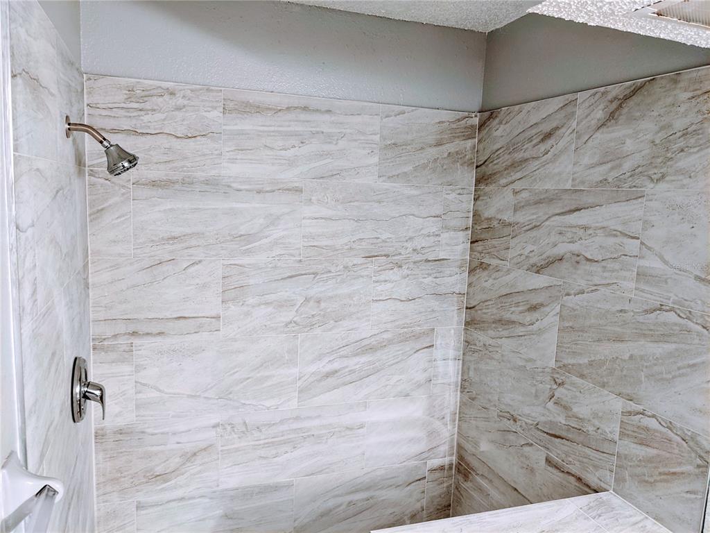 5327 Baldock Avenue Spring Hill, FL 34608 - Photo 6 of 18 a bathroom with a shower
