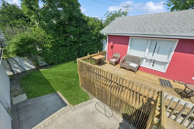 a view of balcony with furniture