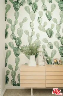 a view of a vase of flowers sitting on a table