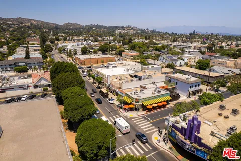 an aerial view of a city with lots of residential buildings