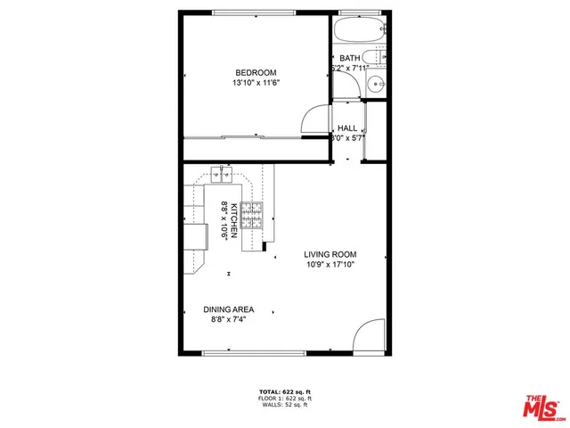 a picture of a bench in front of a wall