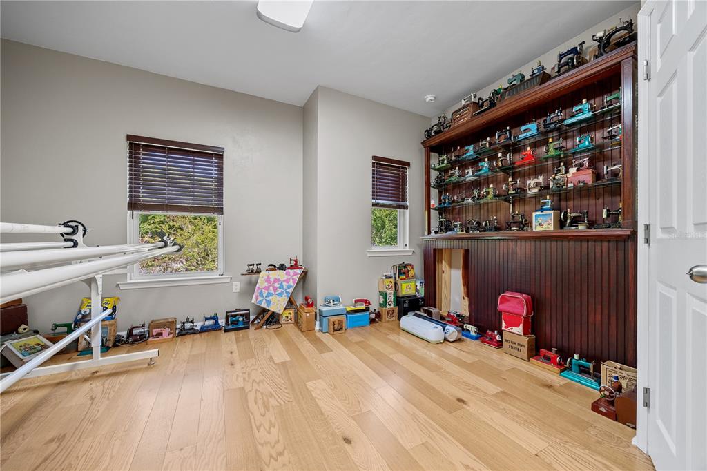 8267 Southwest 78th Lane Gainesville, FL 32608 - Photo 23 of 57 a room with gym equipment and a window