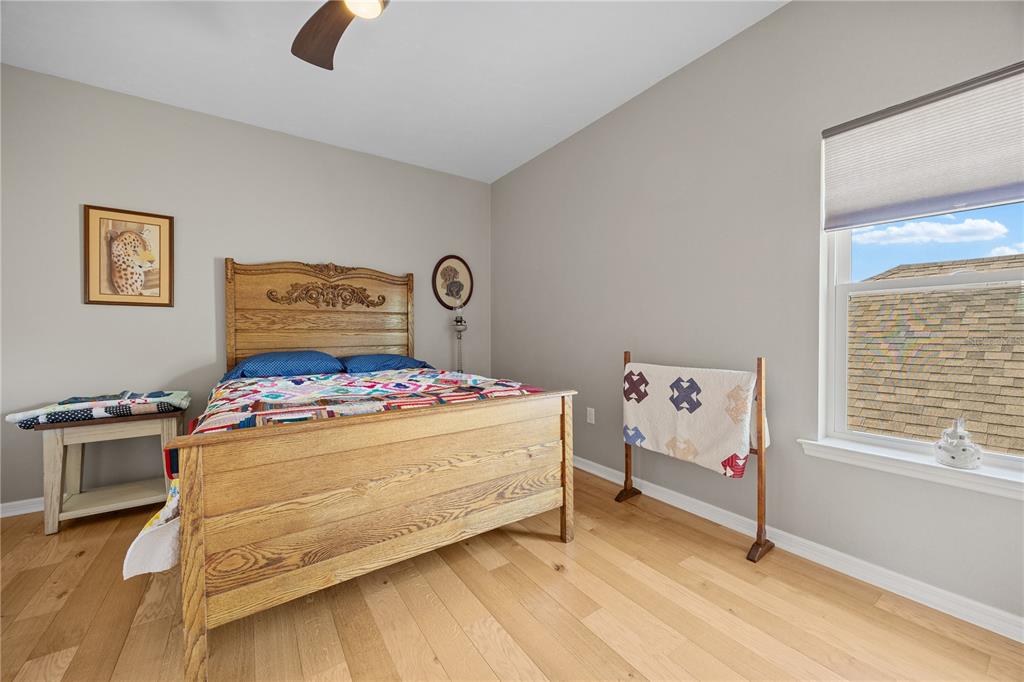 8267 Southwest 78th Lane Gainesville, FL 32608 - Photo 27 of 57 a bedroom with a bed and a window