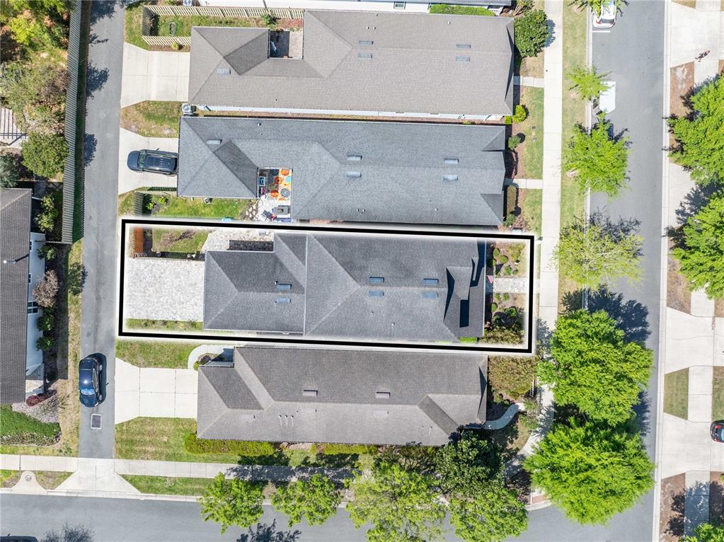 8267 Southwest 78th Lane Gainesville, FL 32608 - Photo 42 of 57 an aerial view of residential houses with outdoor space and street view