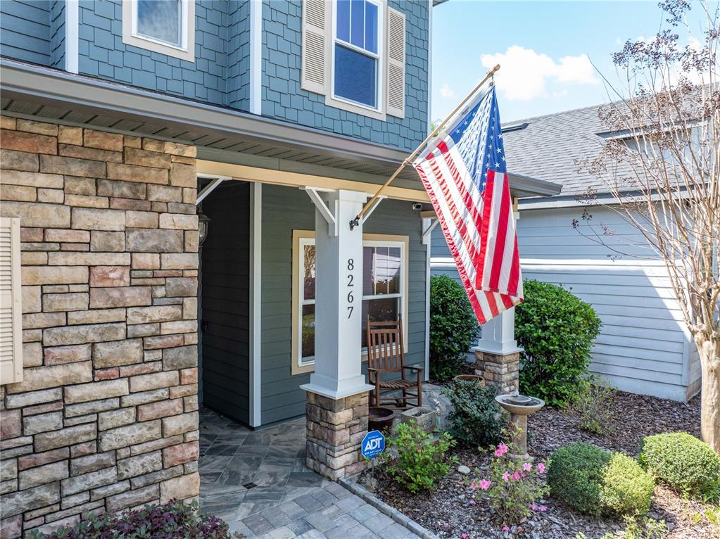 8267 Southwest 78th Lane Gainesville, FL 32608 - Photo 49 of 57 a front view of a house with a yard