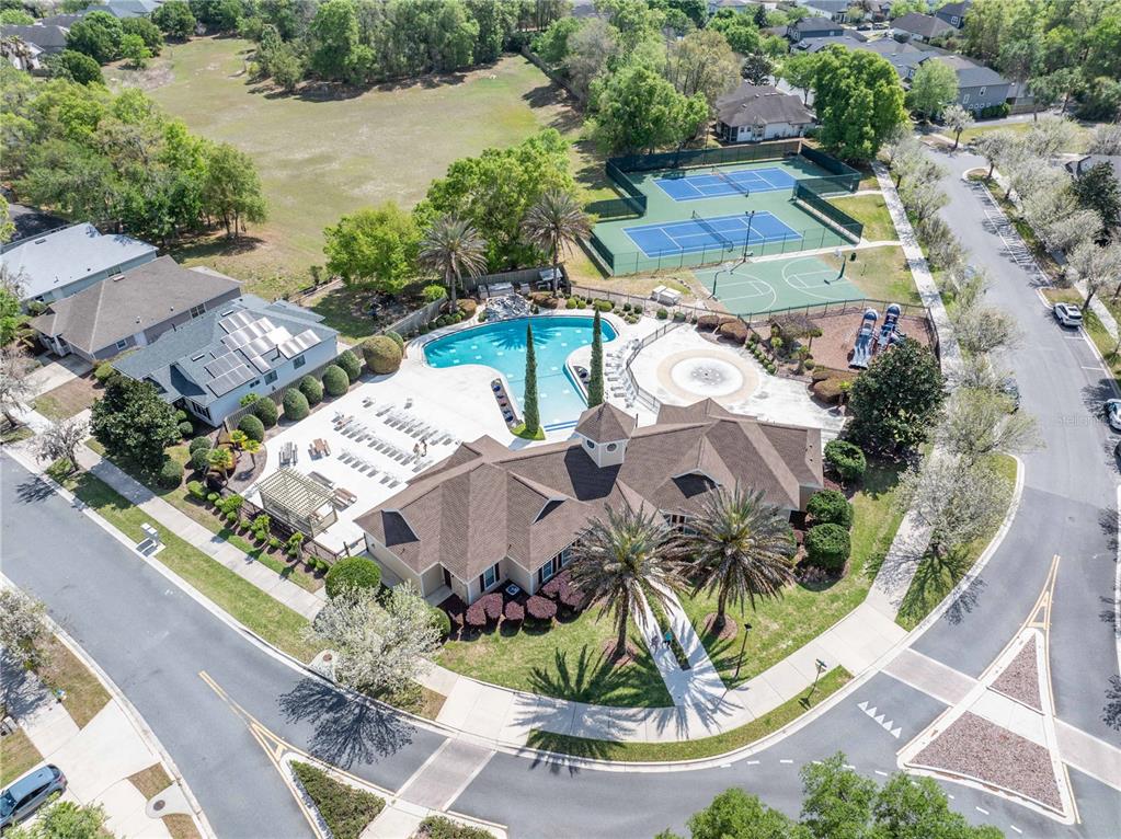 8267 Southwest 78th Lane Gainesville, FL 32608 - Photo 53 of 57 an aerial view of multiple houses with yard
