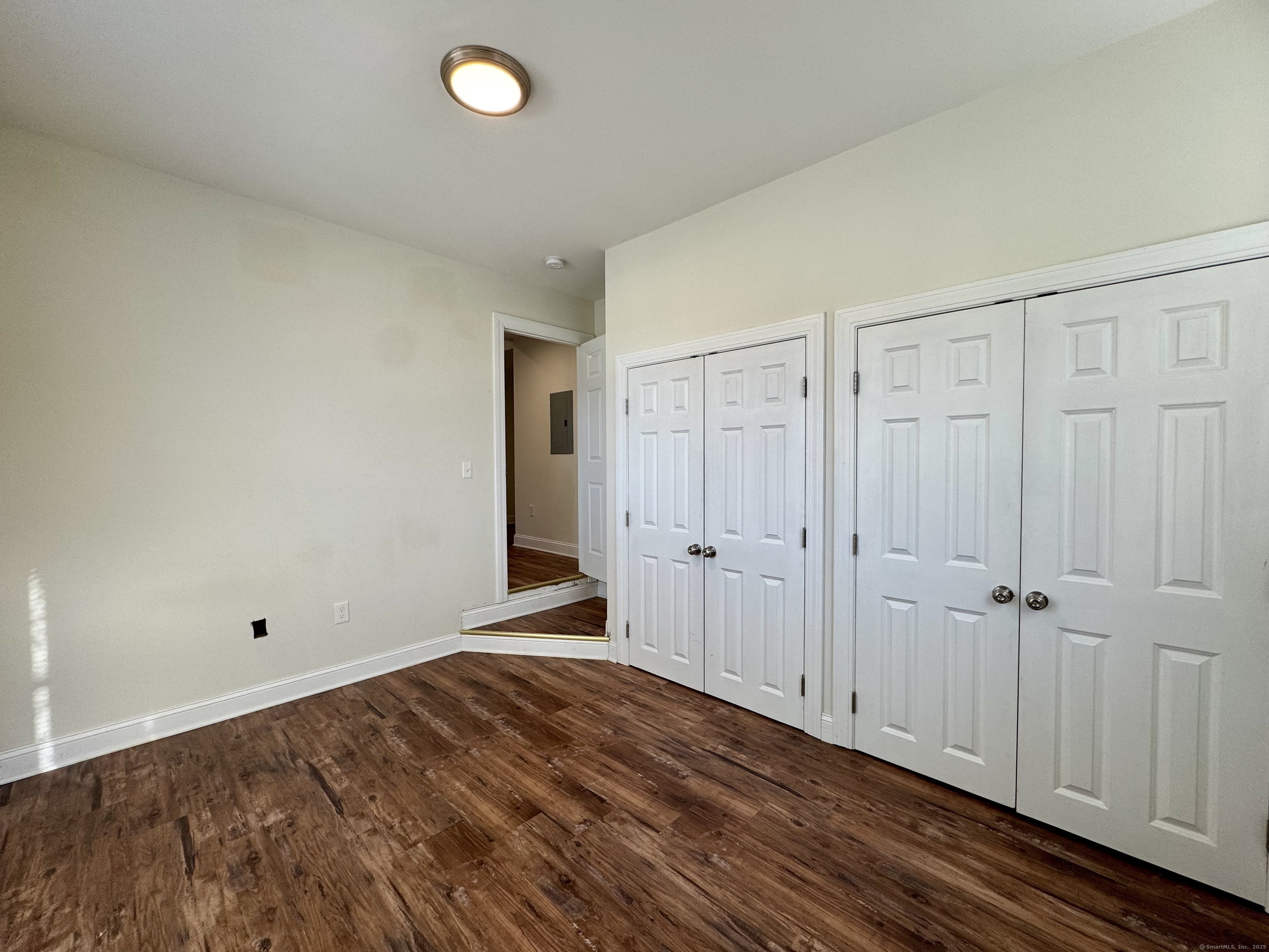 950 Lindley Street Bridgeport, CT 06606 - Photo 14 of 14 a view of a livingroom with wooden floor
