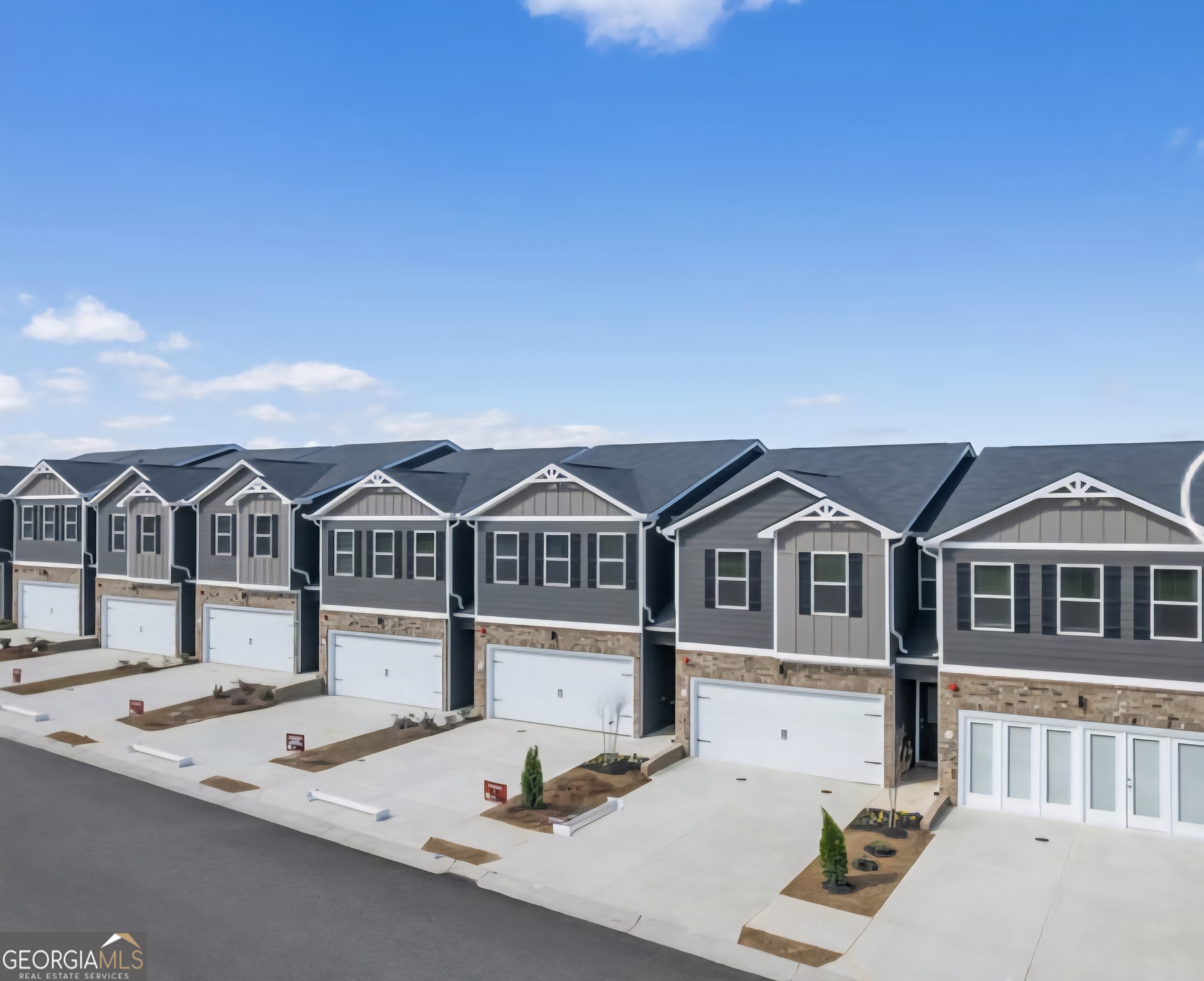 11543 Kimberly Way Hampton, GA 30228 - Photo 3 of 15 a front view of a house with yard and parking space