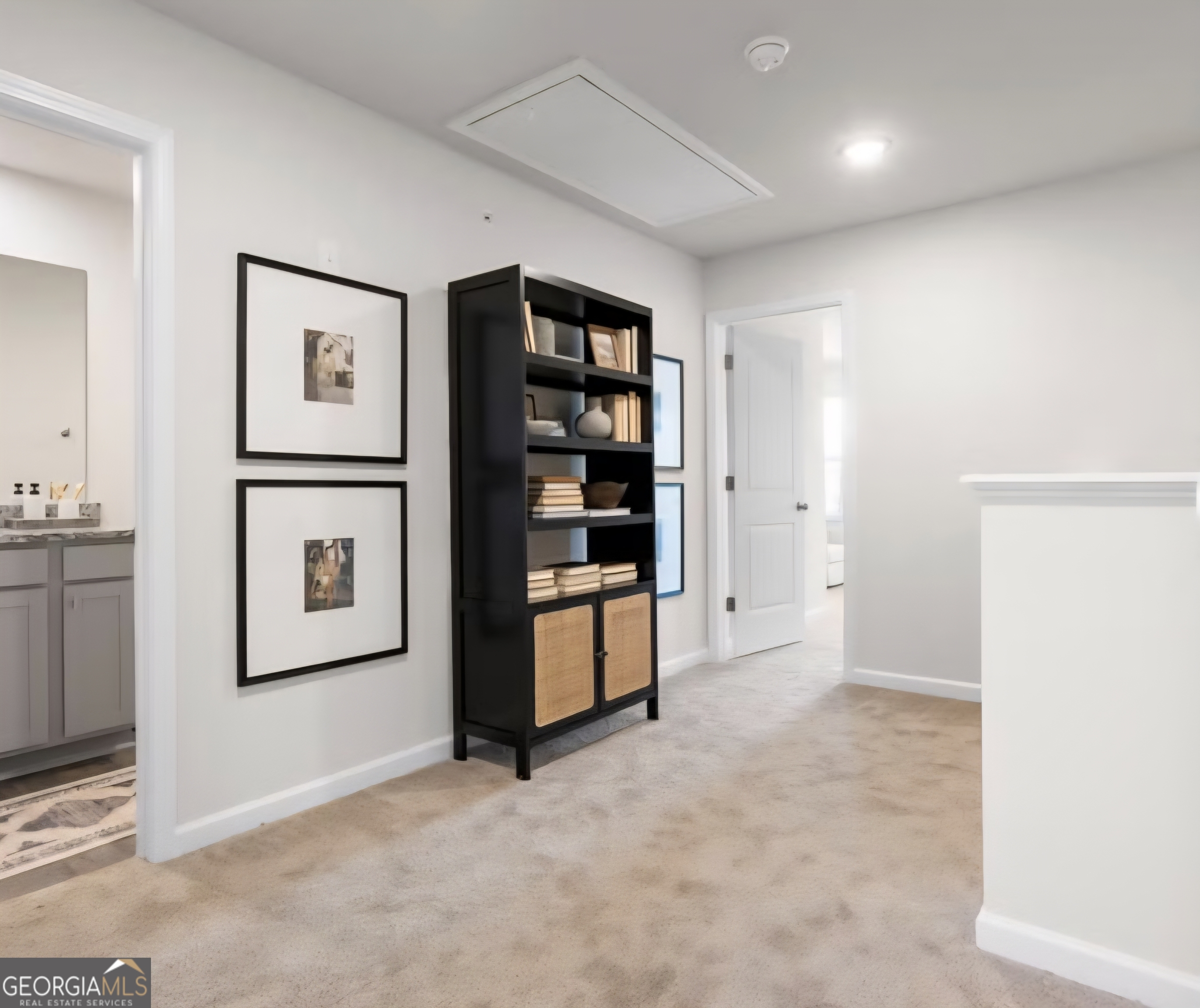 11543 Kimberly Way Hampton, GA 30228 - Photo 9 of 15 a view of an empty room with shelves