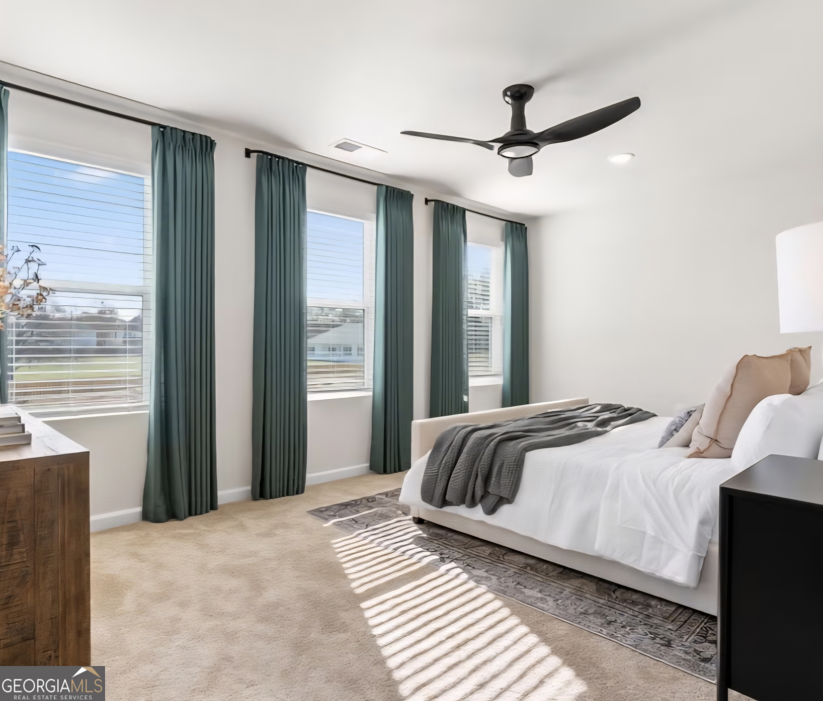 11543 Kimberly Way Hampton, GA 30228 - Photo 10 of 15 a bedroom with a bed and a window