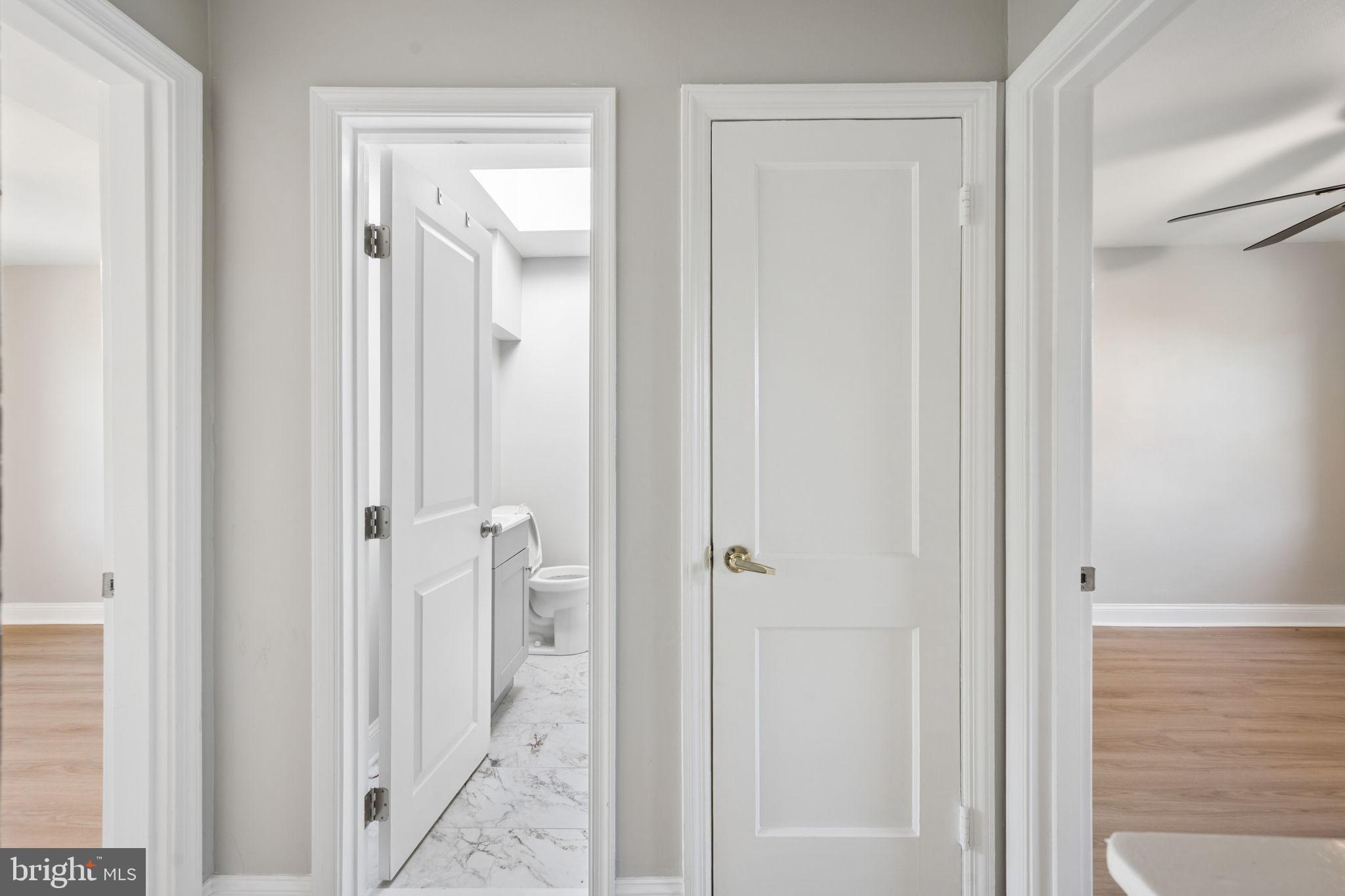 3548 Benzinger Road Baltimore, MD 21229 - Photo 27 of 40 a view of a bathroom from a hallway