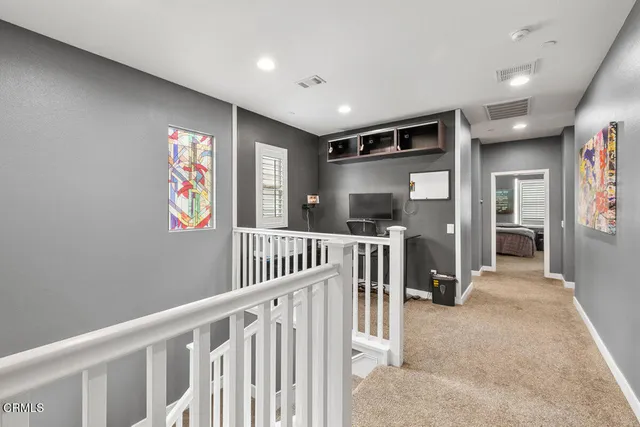 a view of entryway with livingroom