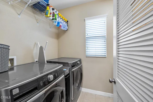 a kitchen with a stove and a sink