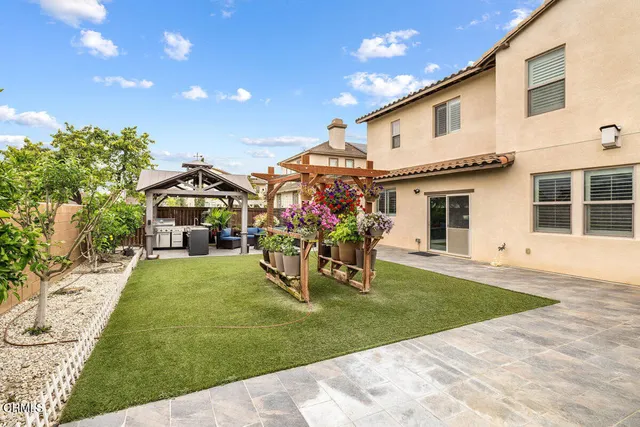 a view of a house with garden