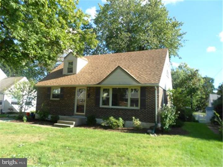 102 Devonshire Road Wilmington, DE 19803 - Photo 1 of 8 front view of a house with a yard