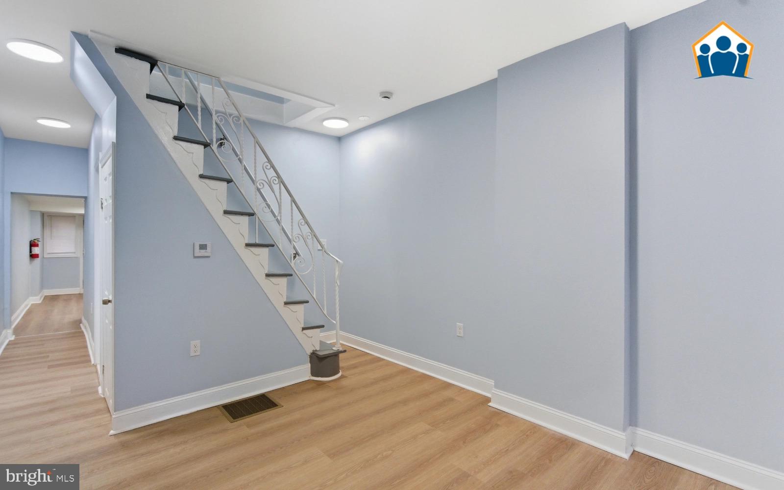2625 Braddock Street Philadelphia, PA 19125 - Photo 7 of 7 a view of entryway with stairs and wooden floor