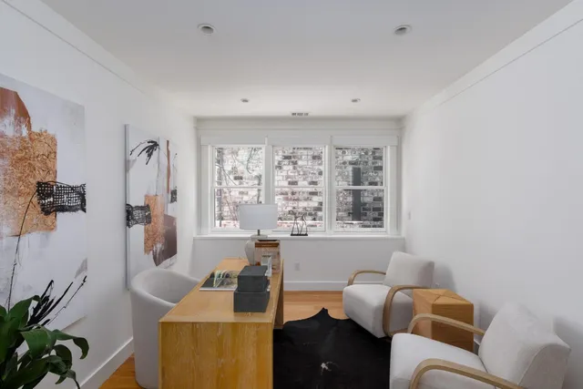 a room with furniture and a window