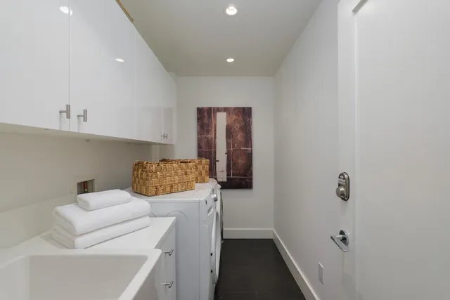 a view of hallway with washer and dryer