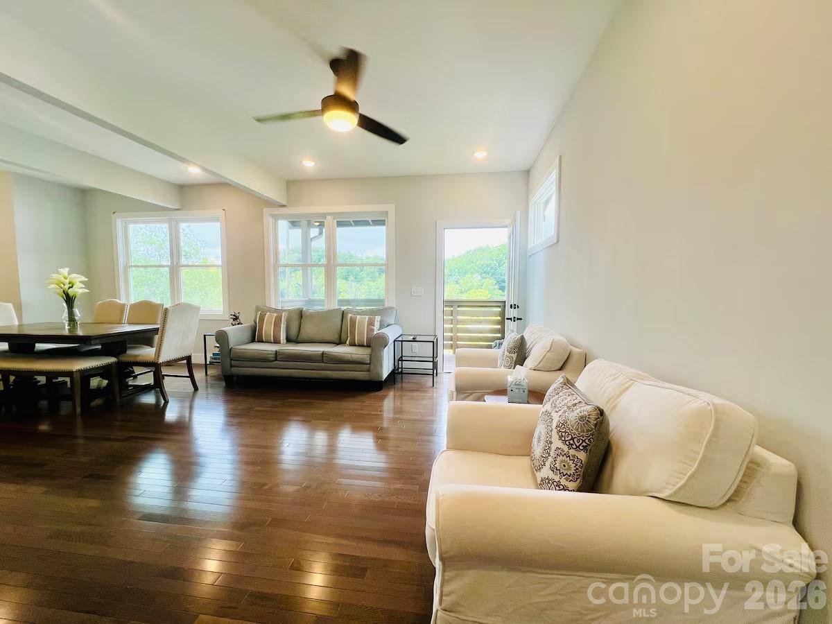 1063 Riverside Drive Asheville, NC 28804 - Photo 3 of 40 a living room with furniture and a large window