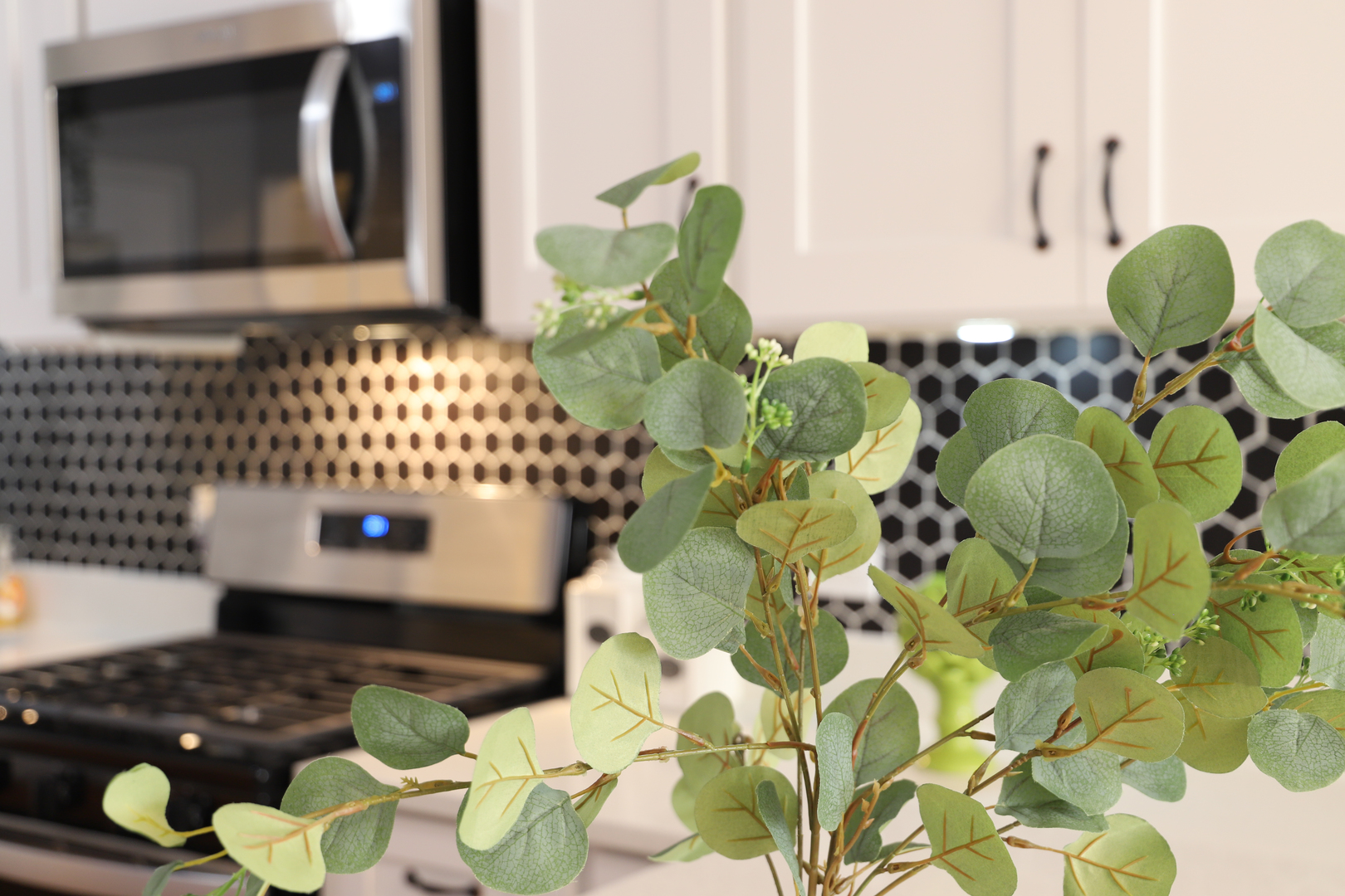 1127 North Ridgeway Avenue Chicago, IL 60651 - Photo 6 of 24 a bathroom with a sink mirror and vanity