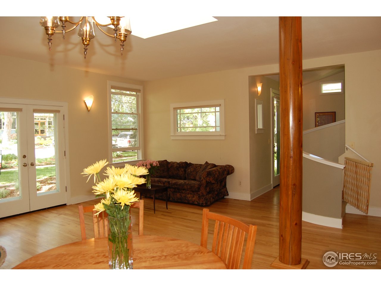 2012 Mapleton Avenue Boulder, CO 80304 - Photo 12 of 14 a living room with furniture and wooden floor