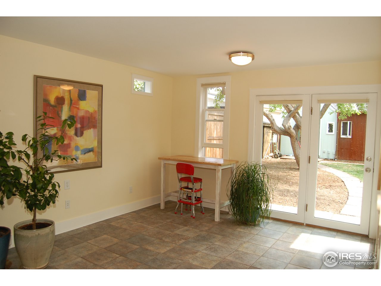 2012 Mapleton Avenue Boulder, CO 80304 - Photo 6 of 14 a living room with furniture and a large window